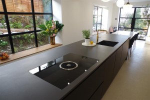 Dekton Domoos worktop, blanco subline sink anthracite and Bora Basic glass ceramic induction cooktop