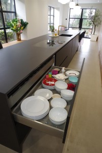 Matte Black kitchen with Dekton Domoos worktop / Calcutta gold quartz tabletop and Bora Basic glass ceramic induction cooktop and appliances by Siemens